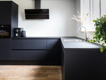 kitchen wrapped in black vinyl